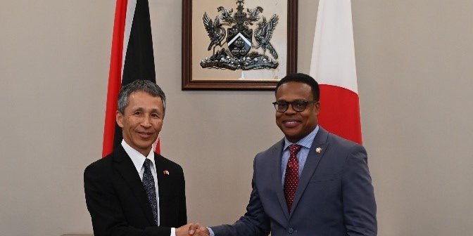 Minister Amery Browne greets Yutaka Matsubara